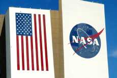 Hand-painted flag and NASA logo on VAB